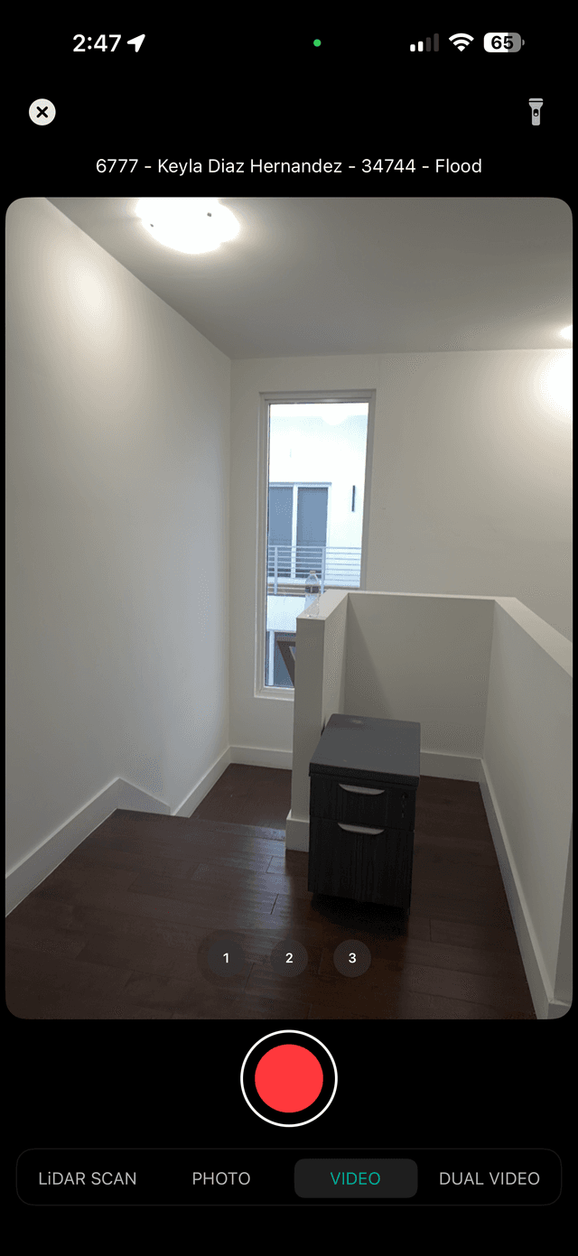 Estimatics iOS app in Video recording mode capturing a room